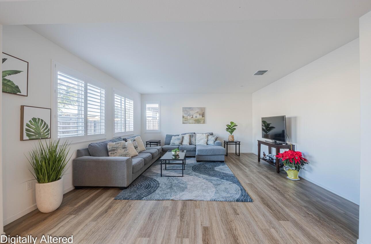 570 Tankersley Street Soledad, CA 93960 - Photo 6 of 64 a living room with furniture and a potted plant