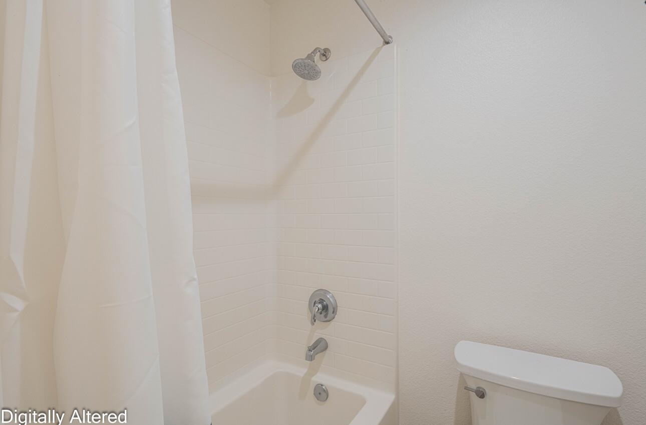 570 Tankersley Street Soledad, CA 93960 - Photo 63 of 64 a white toilet sitting next to a bath tub