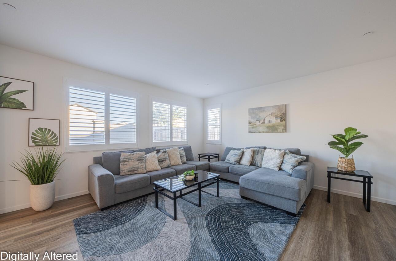 570 Tankersley Street Soledad, CA 93960 - Photo 8 of 64 a living room with furniture and a potted plant