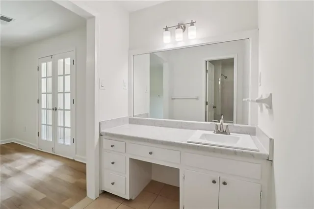 a view of a street with a building in the background