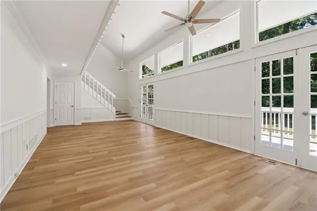 a view of a hallway view with staircase