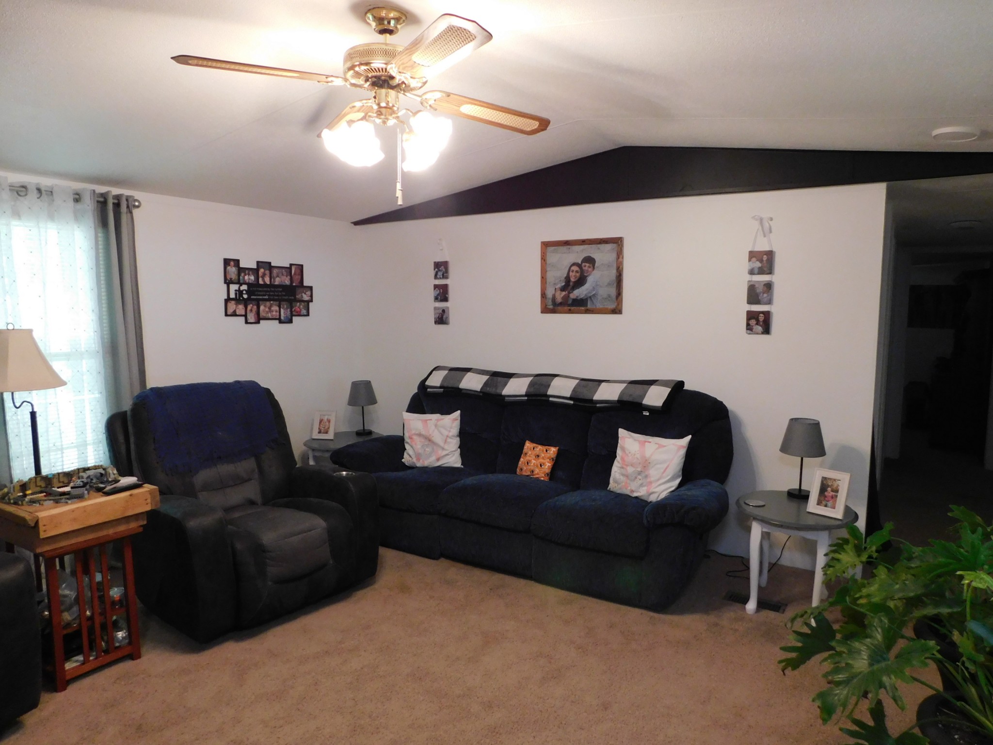 107 Haylee Road Waverly, TN 37185 - Photo 33 of 49 a living room with furniture and a potted plant