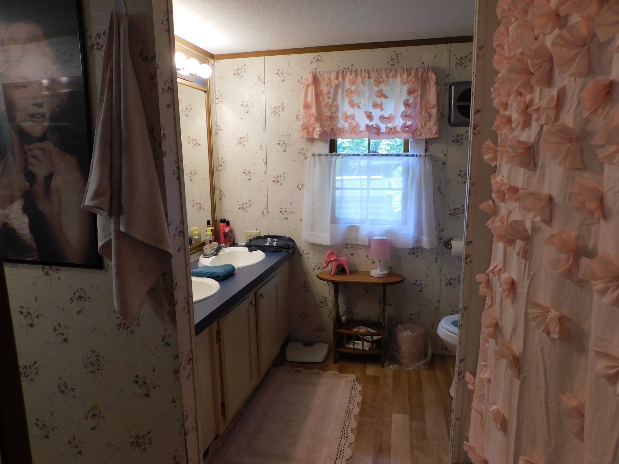 107 Haylee Road Waverly, TN 37185 - Photo 40 of 49 a kitchen with a sink and a refrigerator