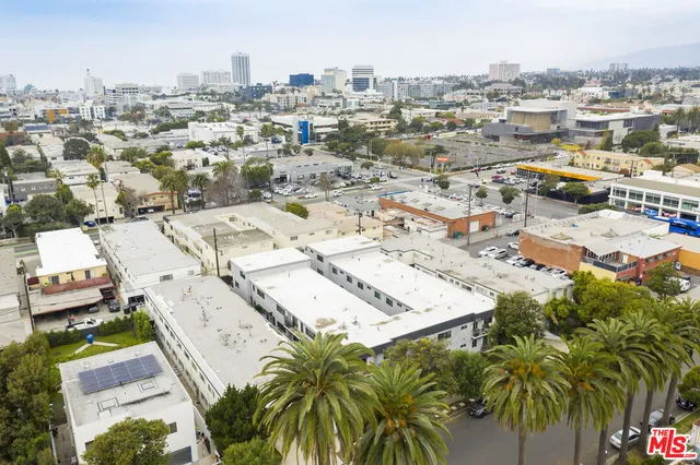 an aerial view of residential building with parking space