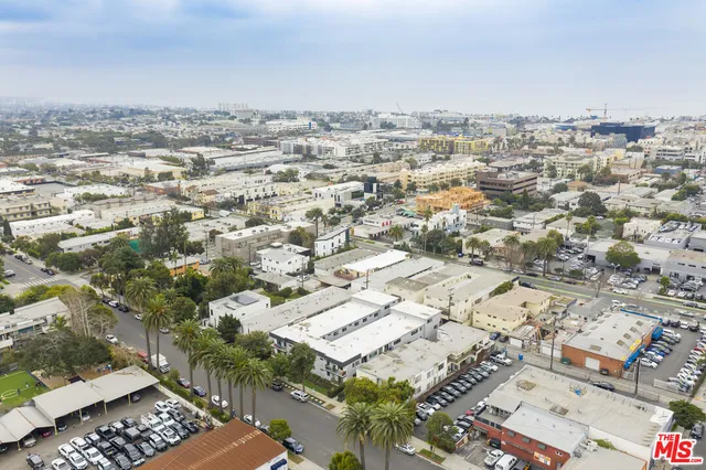 an aerial view of a city with lots of residential buildings