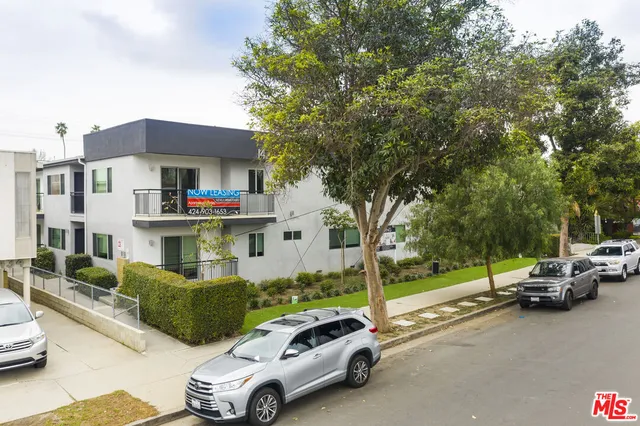 a car parked in front of a house