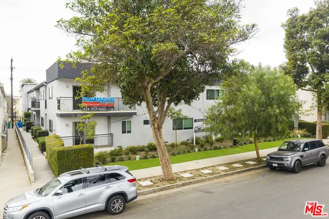 a car parked in front of a house