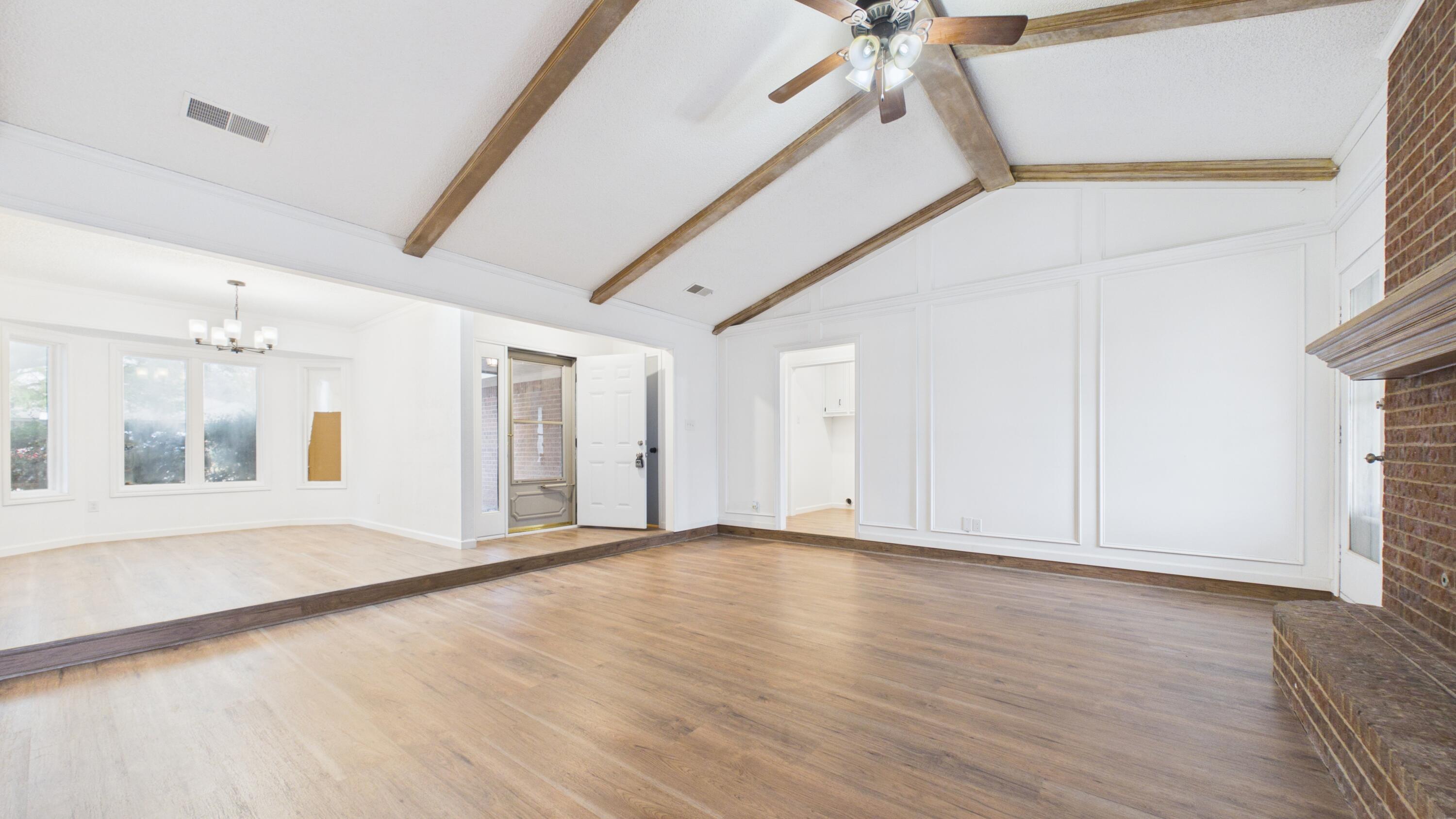 6902 Homestead Avenue Lubbock, TX 79424 - Photo 7 of 17 a view of an empty room with a window