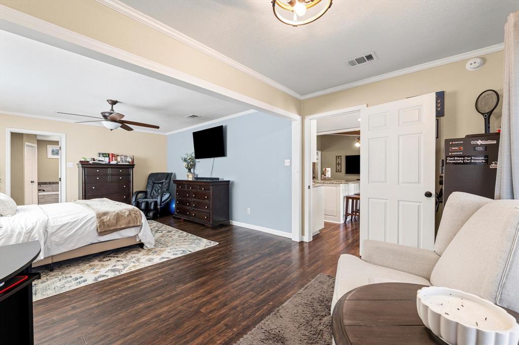 134 Thiele Road Lorena, TX 76655 - Photo 12 of 37 a living room with furniture and a wooden floor