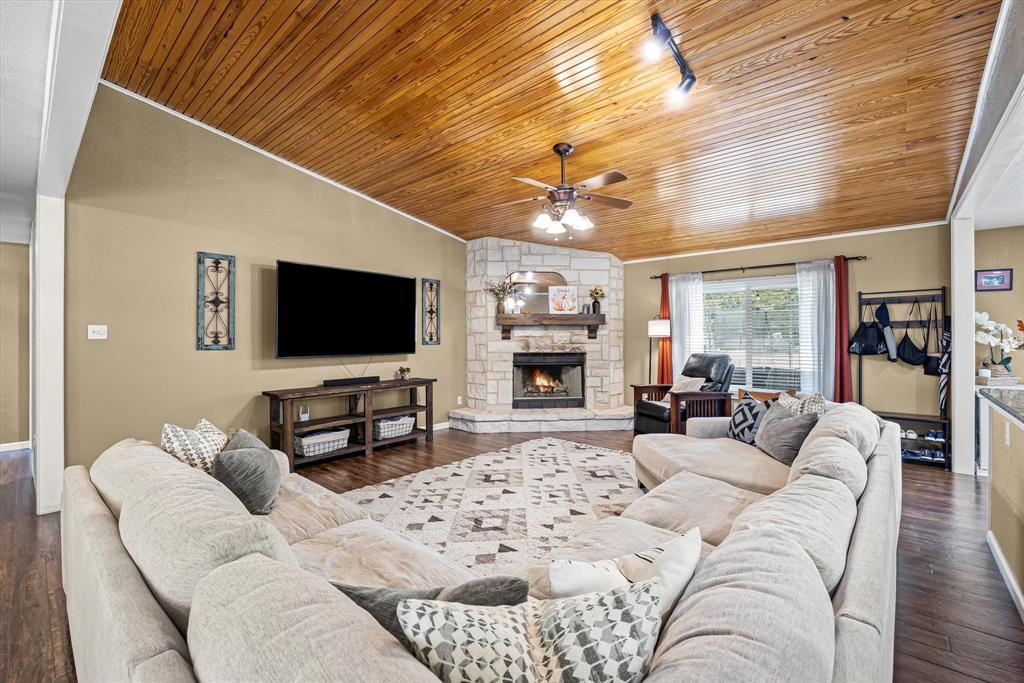 134 Thiele Road Lorena, TX 76655 - Photo 20 of 37 a living room with furniture and a flat screen tv
