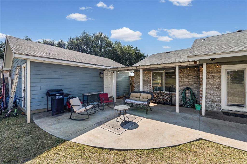 134 Thiele Road Lorena, TX 76655 - Photo 30 of 37 a view of a house with backyard and sitting area