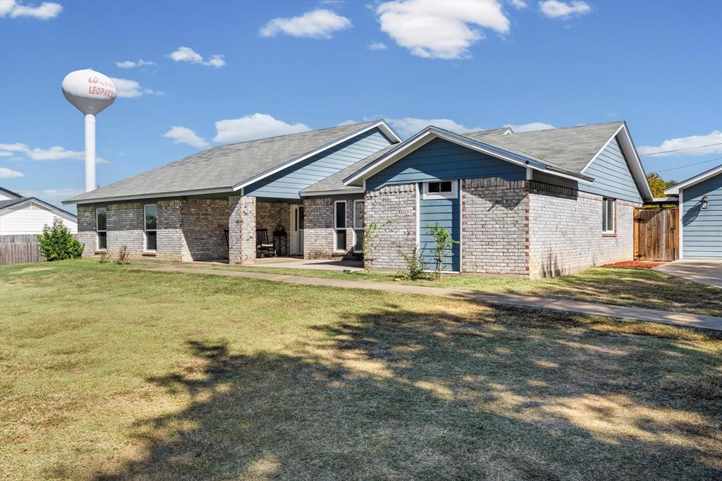 134 Thiele Road Lorena, TX 76655 - Photo 35 of 37 a front view of a house with a yard
