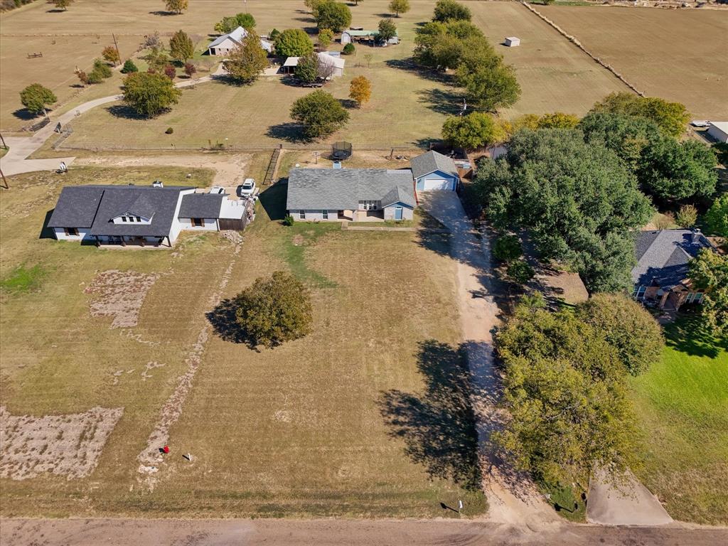134 Thiele Road Lorena, TX 76655 - Photo 4 of 37 a aerial view of residential houses with outdoor space