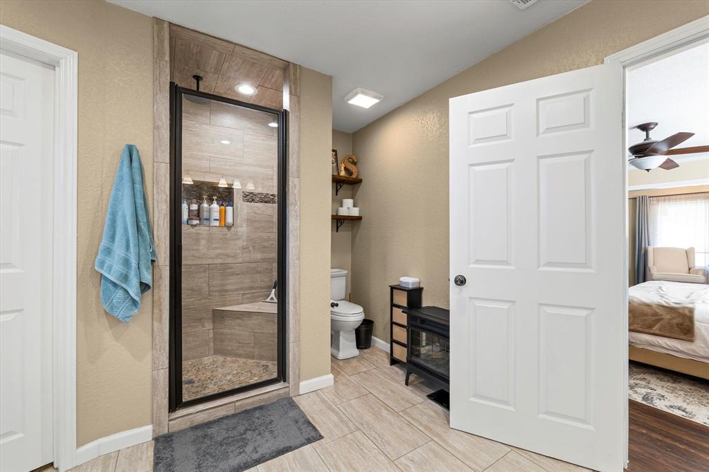 134 Thiele Road Lorena, TX 76655 - Photo 8 of 37 a bathroom with a shower and a sink