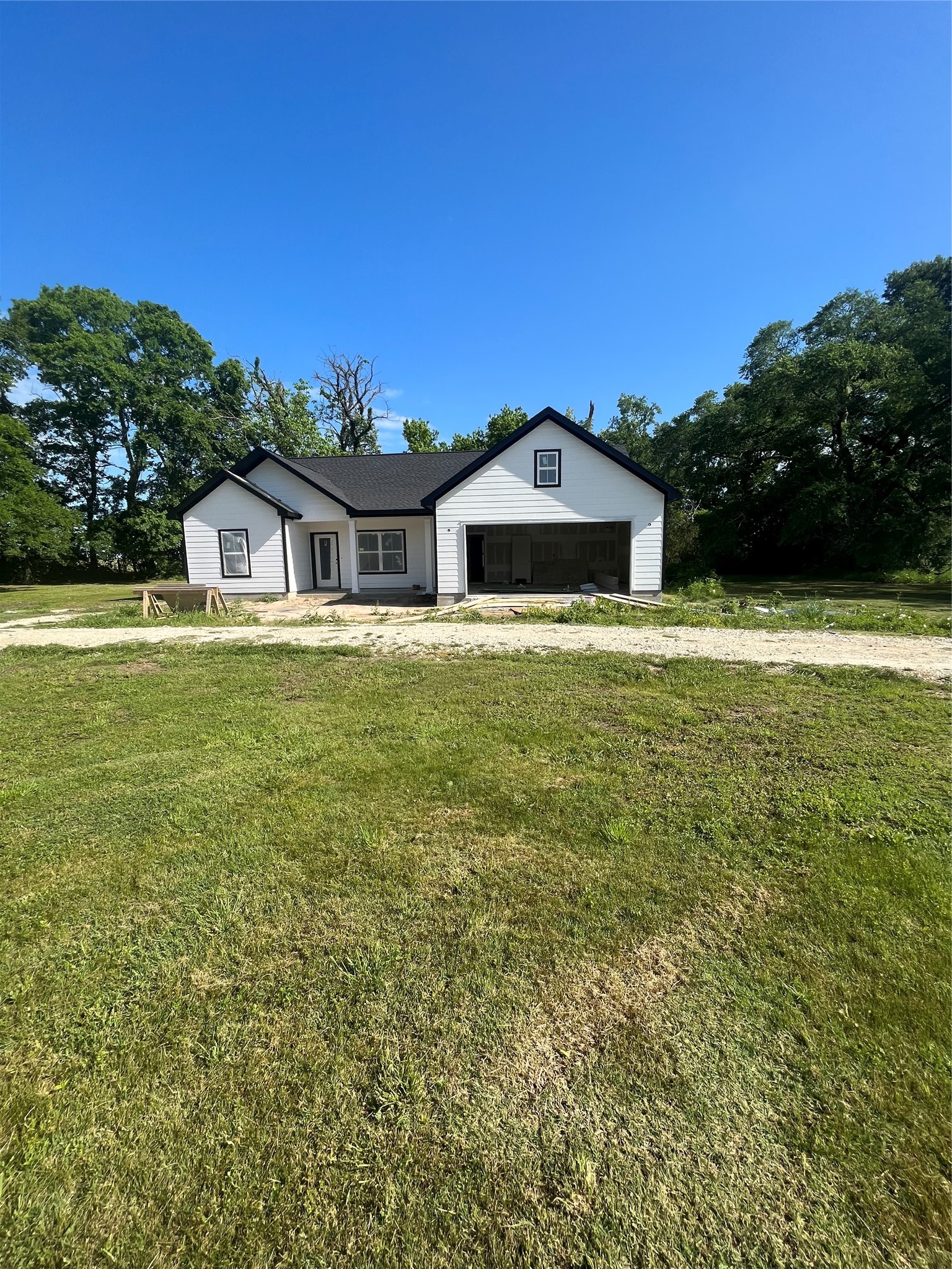 111 Heatherbrook Somerville, TX 77879 - Photo 10 of 11 a front view of a house with a yard