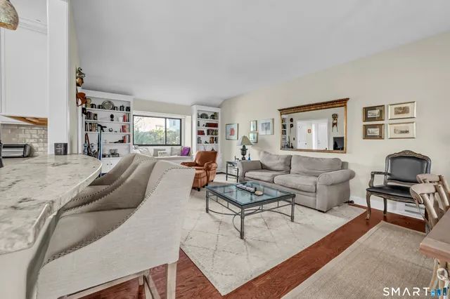 a living room with furniture and a couch