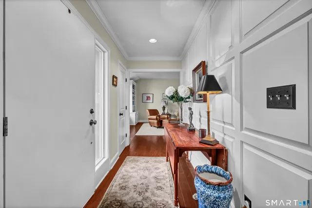 a very nice looking dining room with a table and chairs