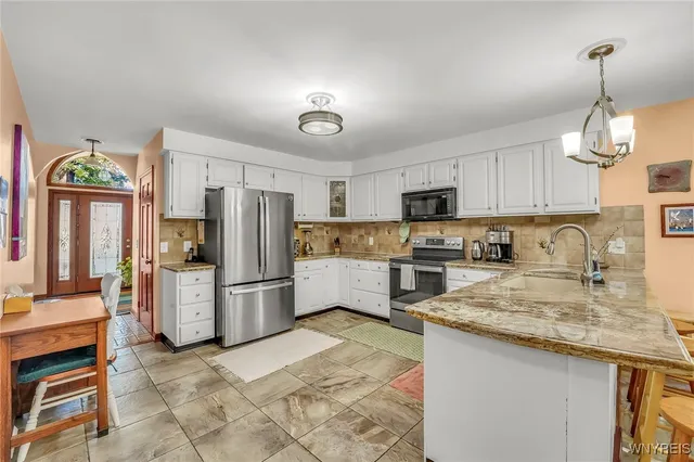 $595,000 | 6050 Whitegate Crossing, Clarence, NY 14051