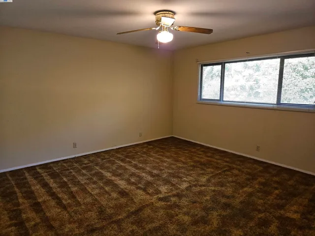 an aerial view of a house with yard swimming pool and outdoor seating