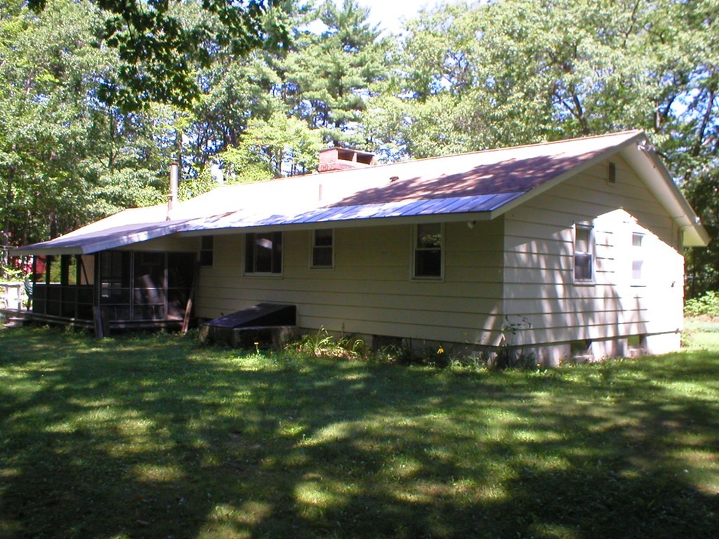 603 Turnpike Road Ashby, MA 01431 - Photo 14 of 17 a view of a house with a yard