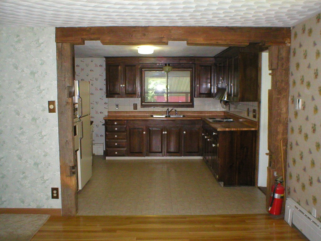 603 Turnpike Road Ashby, MA 01431 - Photo 4 of 17 a large kitchen with stainless steel appliances granite countertop a sink and cabinets