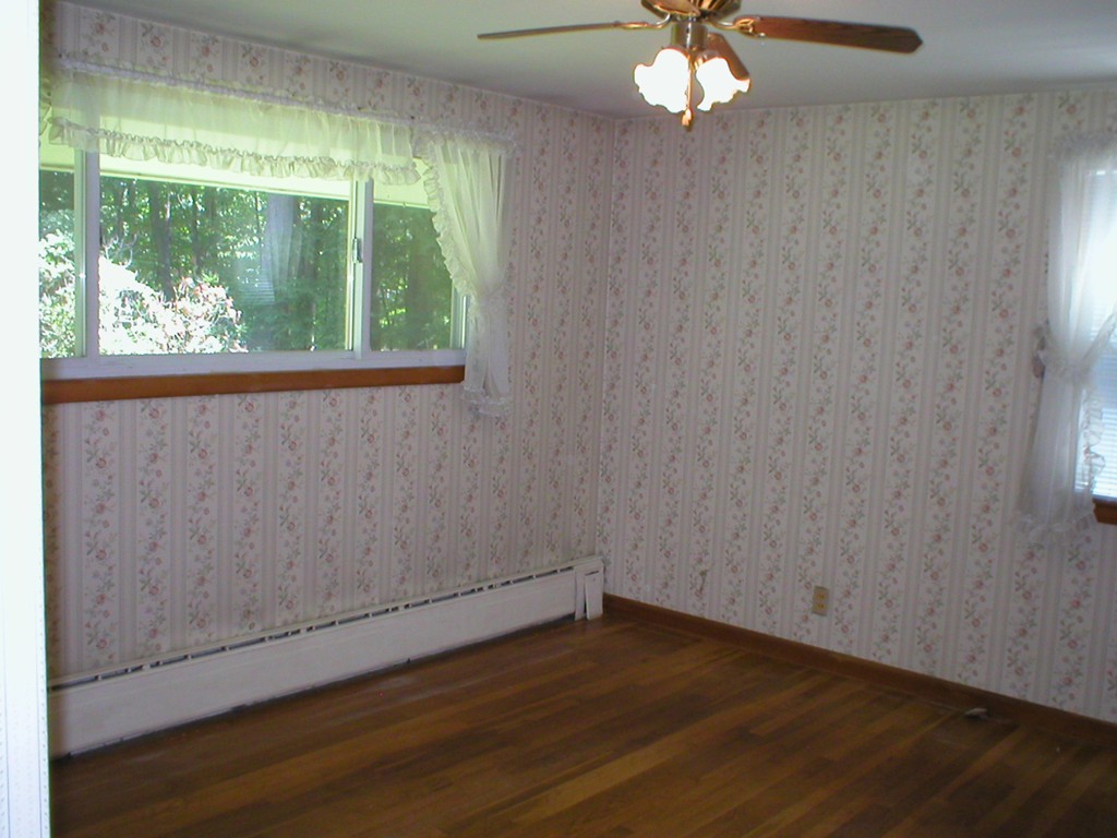 603 Turnpike Road Ashby, MA 01431 - Photo 10 of 17 wooden floor in an empty room with a window