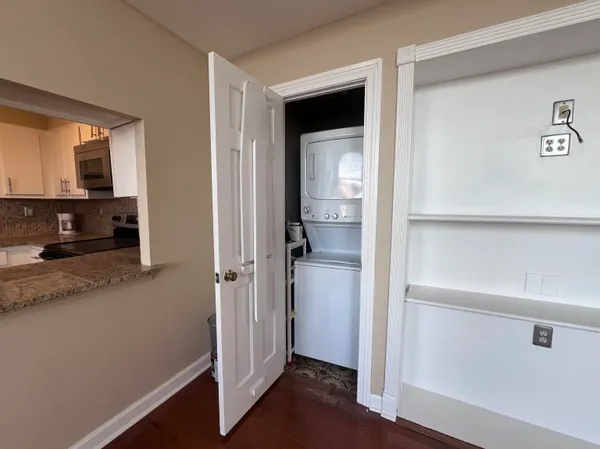a view of storage and utility room in closet