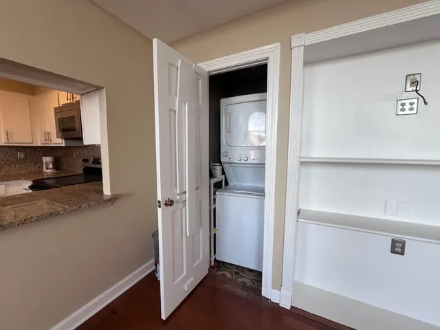 a view of storage and utility room in closet