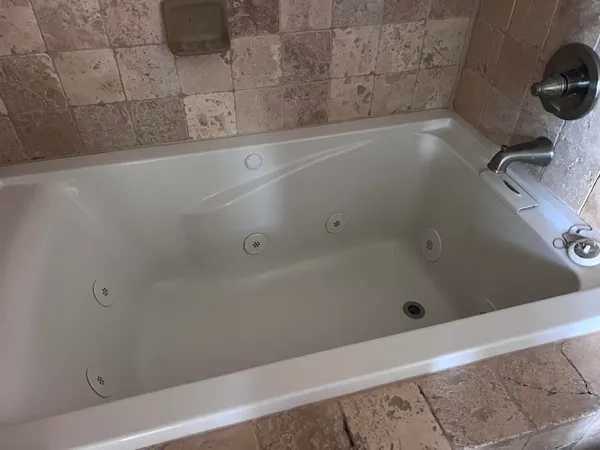 a bathroom with a bathtub