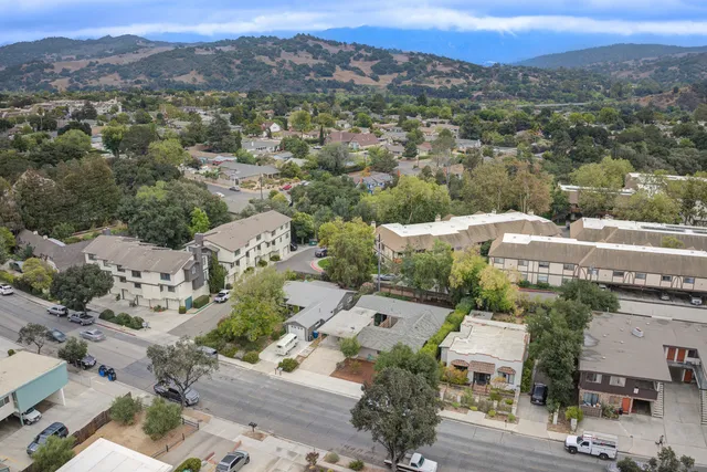 an aerial view of a city with lots of residential buildings