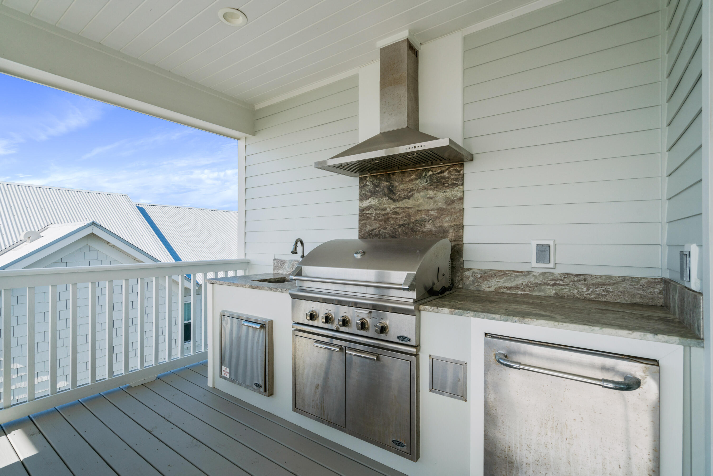 7 Mathis Cove Inlet Beach Inlet Beach, FL 32461 - Photo 54 of 72 a kitchen with stainless steel appliances granite countertop a stove and a sink