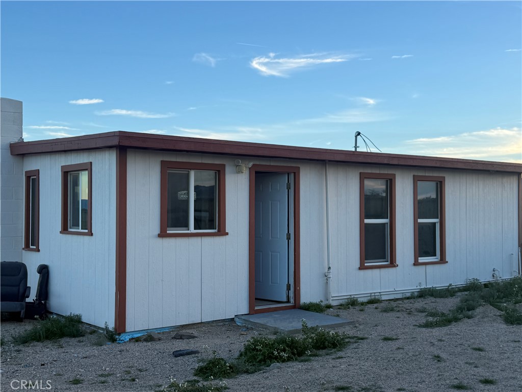 81818 Carey Road Twentynine Palms, CA 92277 - Photo 6 of 7 a front view of a house