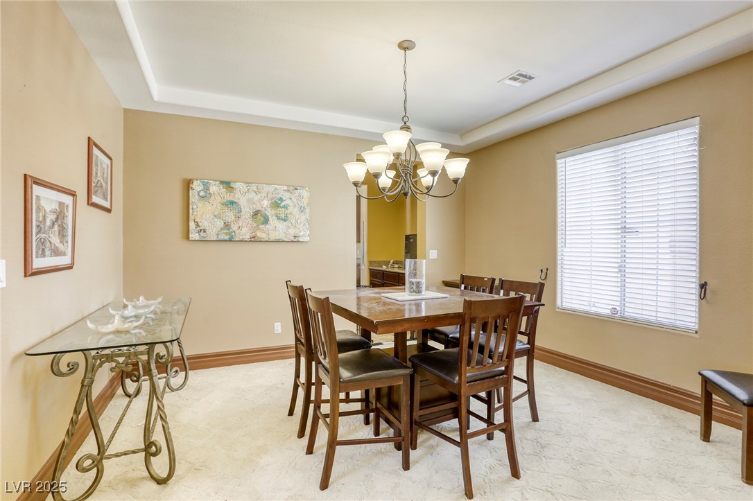 7516 Via Fiorentino Street Las Vegas, NV 89131 - Photo 68 of 94 Enjoy a formal dining room, just beyond the butler's pantry!