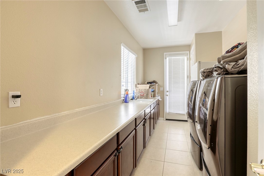 7516 Via Fiorentino Street Las Vegas, NV 89131 - Photo 75 of 94 Acres of counter space in your laundry room!