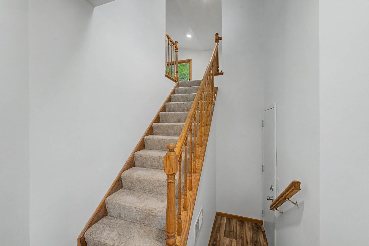 1953 North Coldspring Road Arlington Heights, IL 60004 - Photo 5 of 27 a view of entryway and hall with wooden floor