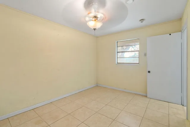 a view of a park with large trees