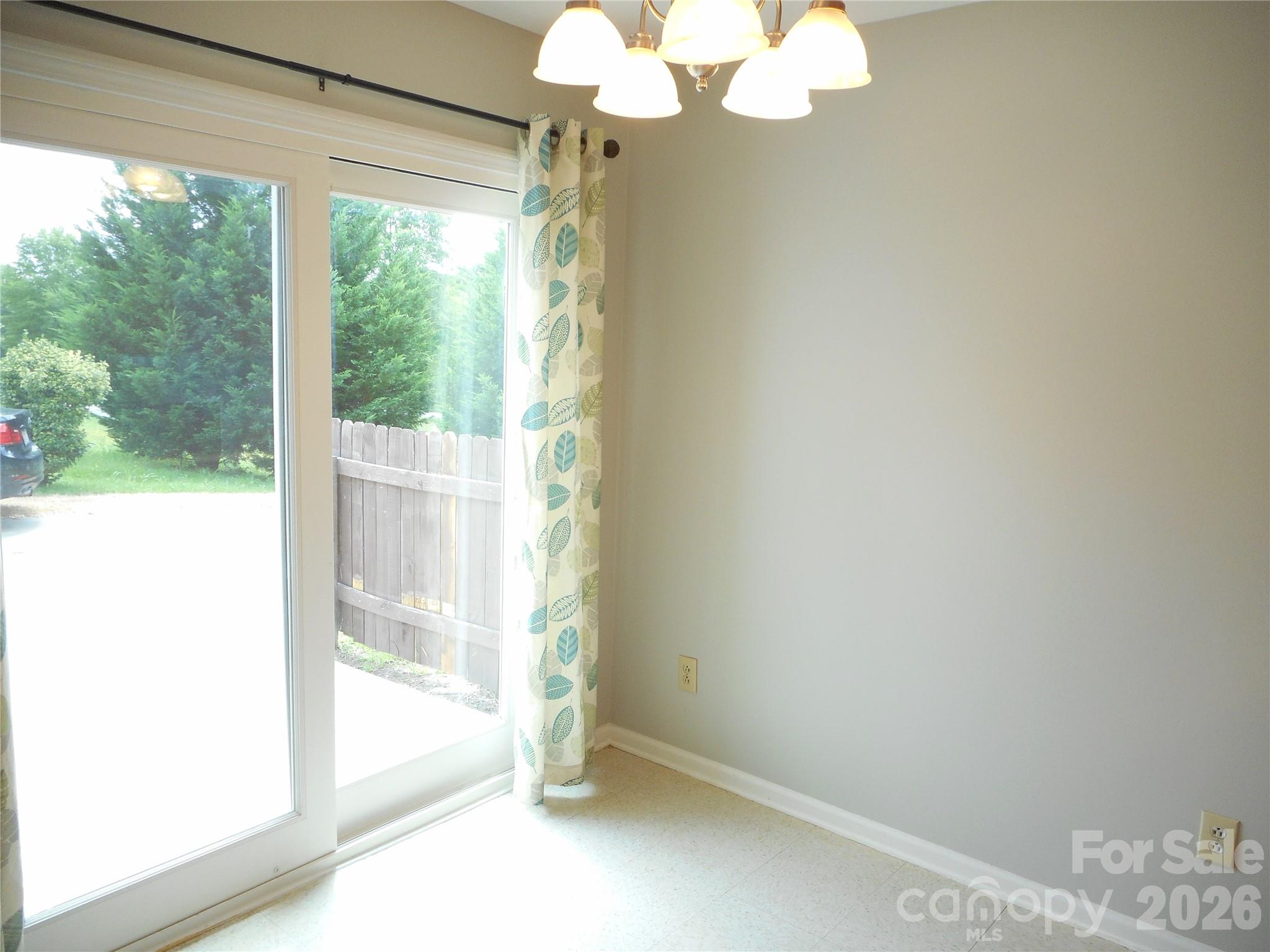 8001 Carmel Road Charlotte, NC 28226 - Photo 11 of 22 a view of livingroom with window