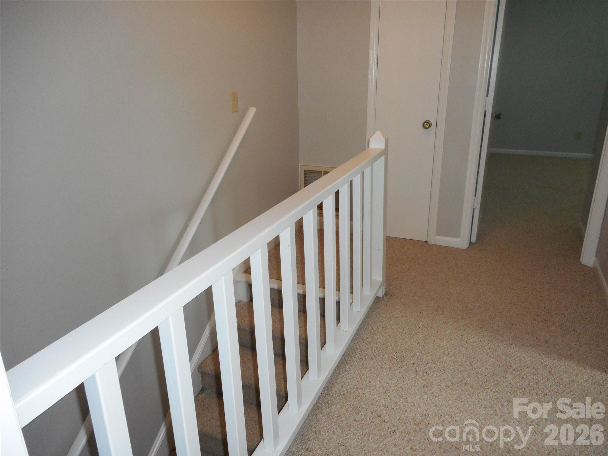 8001 Carmel Road Charlotte, NC 28226 - Photo 13 of 22 a view of a stairs and an entryway