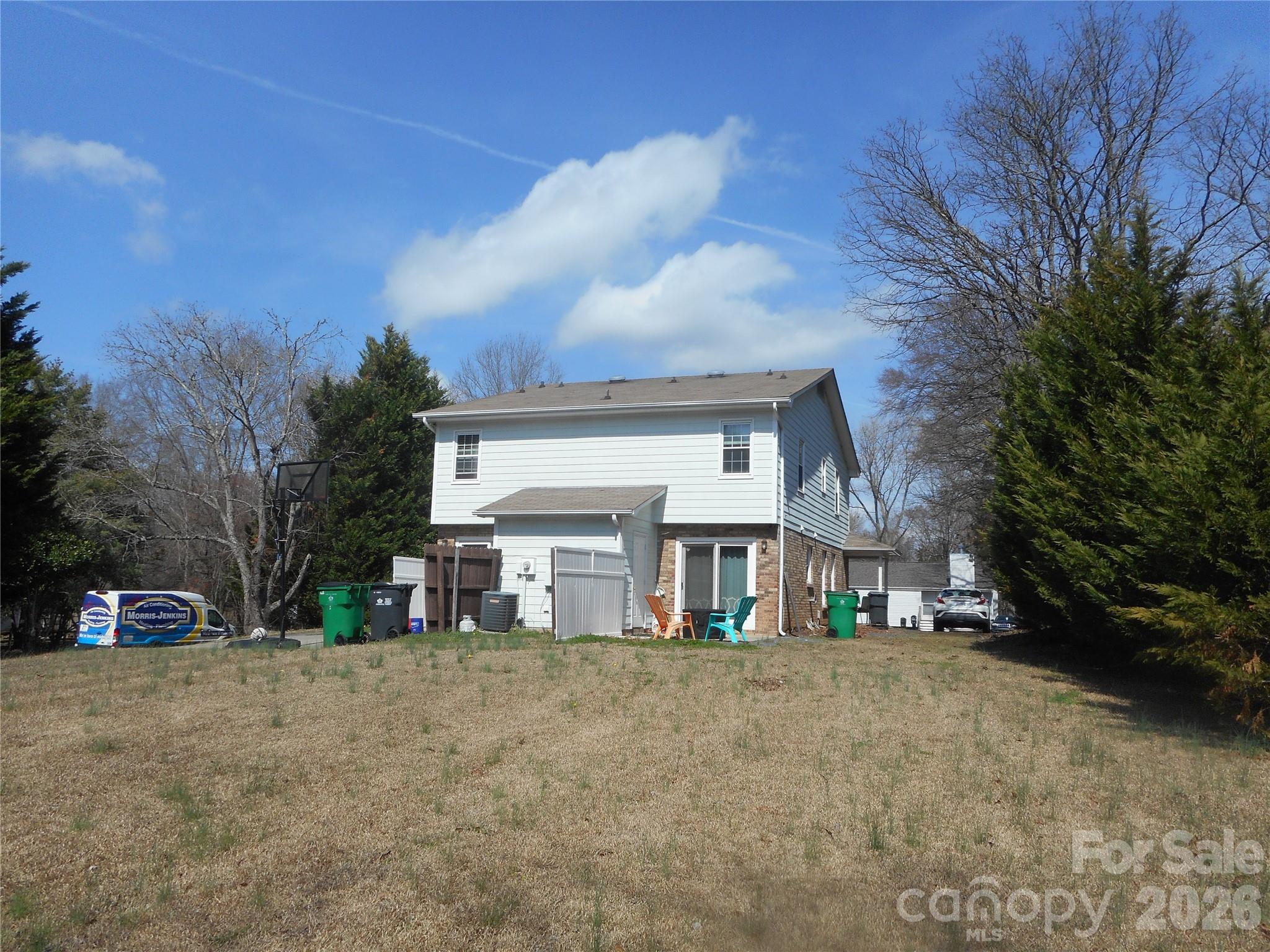 8001 Carmel Road Charlotte, NC 28226 - Photo 17 of 22 a view of house with outdoor space and street view