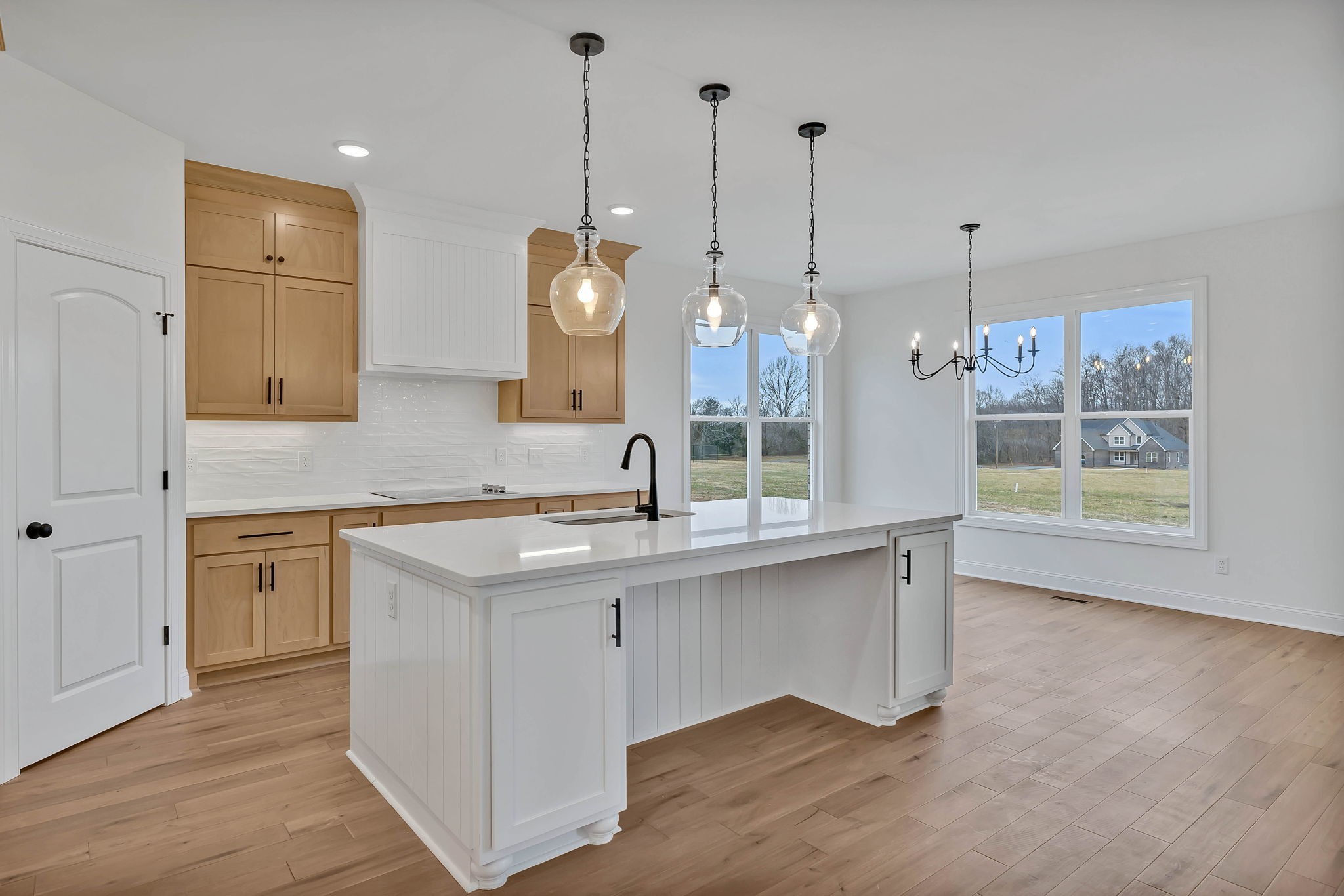 7341 North Milton Road Milton, TN 37118 - Photo 12 of 36 a kitchen with a sink a counter space and wooden floor