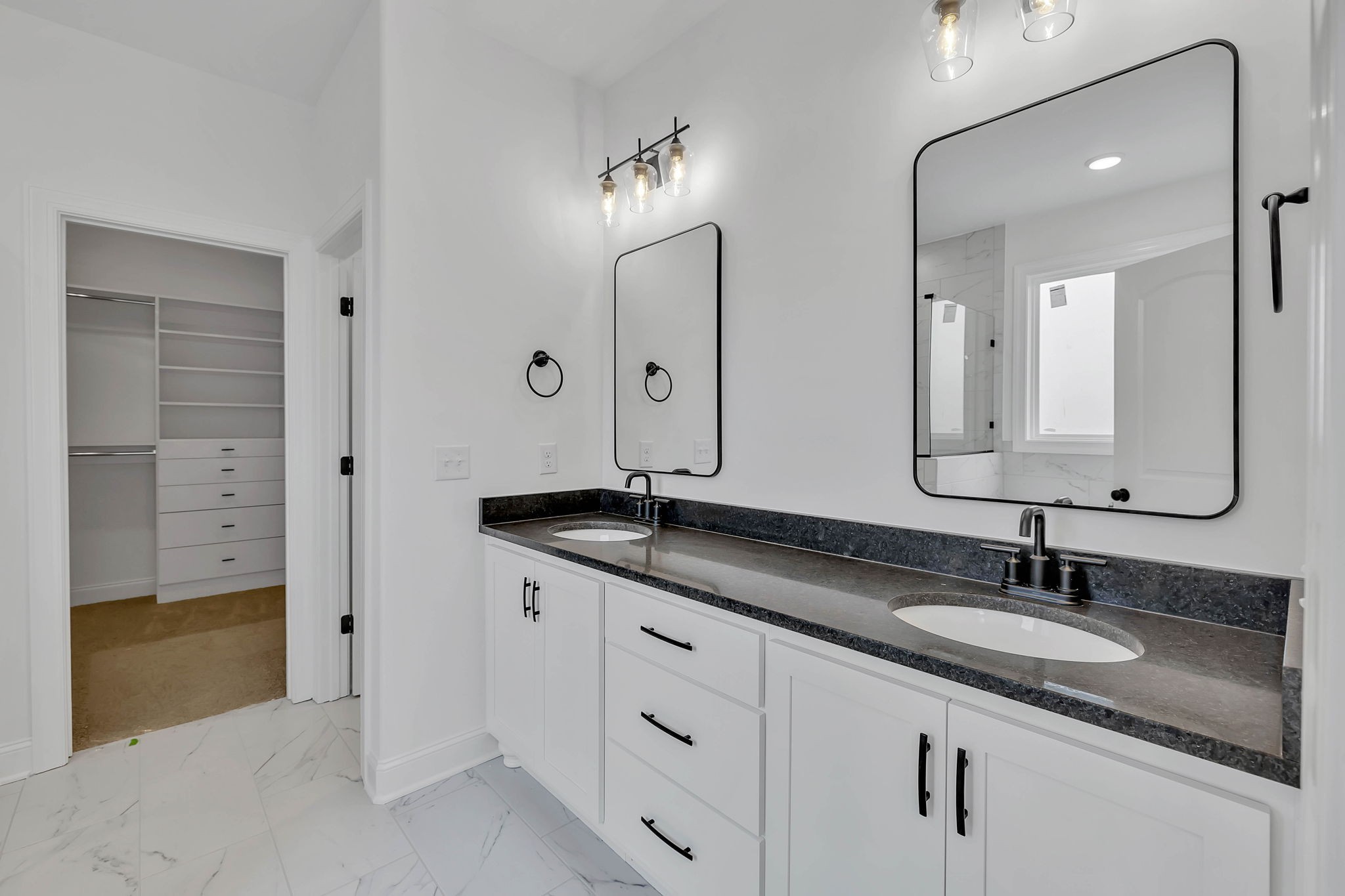 7341 North Milton Road Milton, TN 37118 - Photo 21 of 36 a bathroom with double sink and a mirror