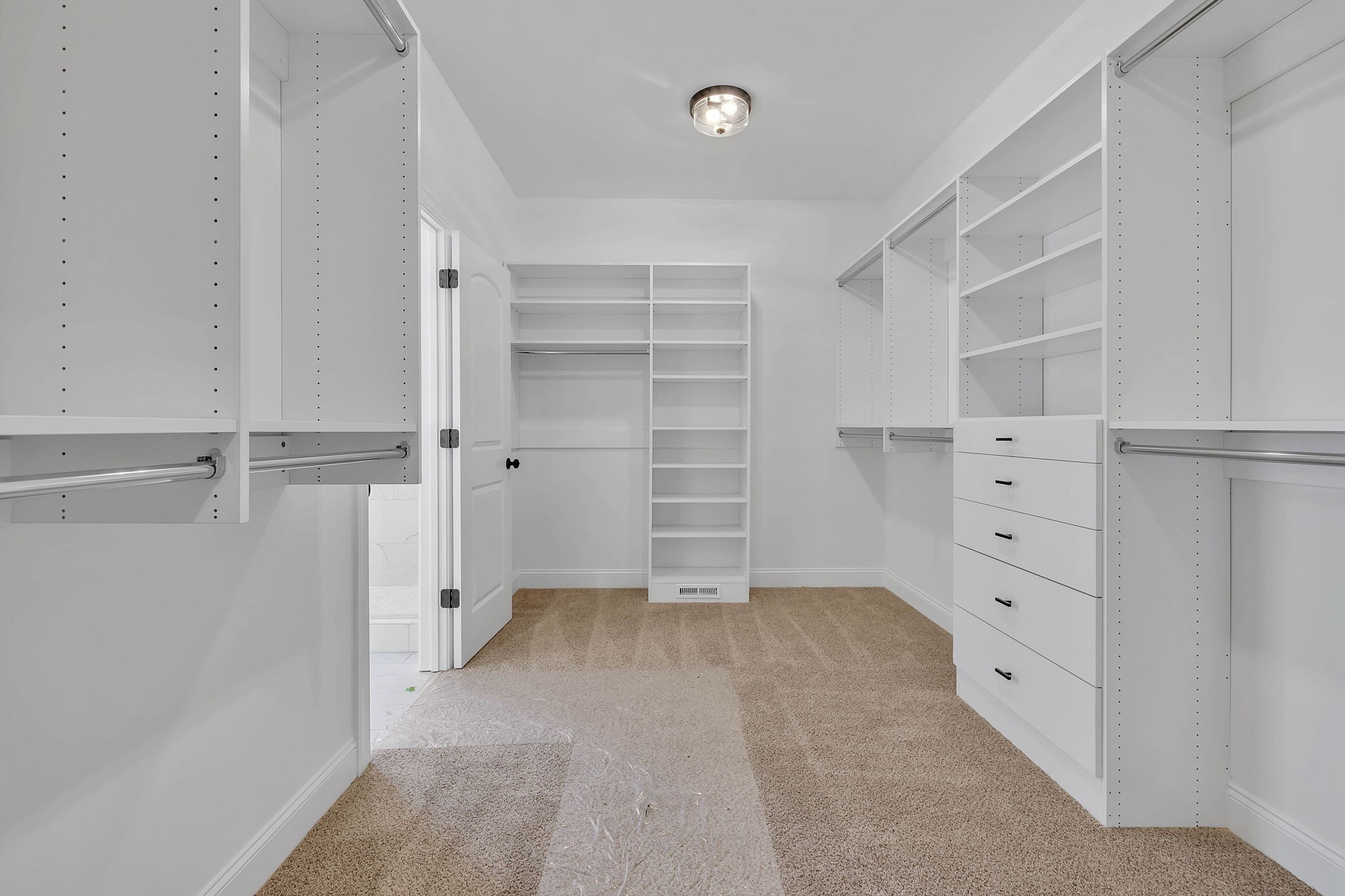 7341 North Milton Road Milton, TN 37118 - Photo 24 of 36 a view of walk in closet with empty racks