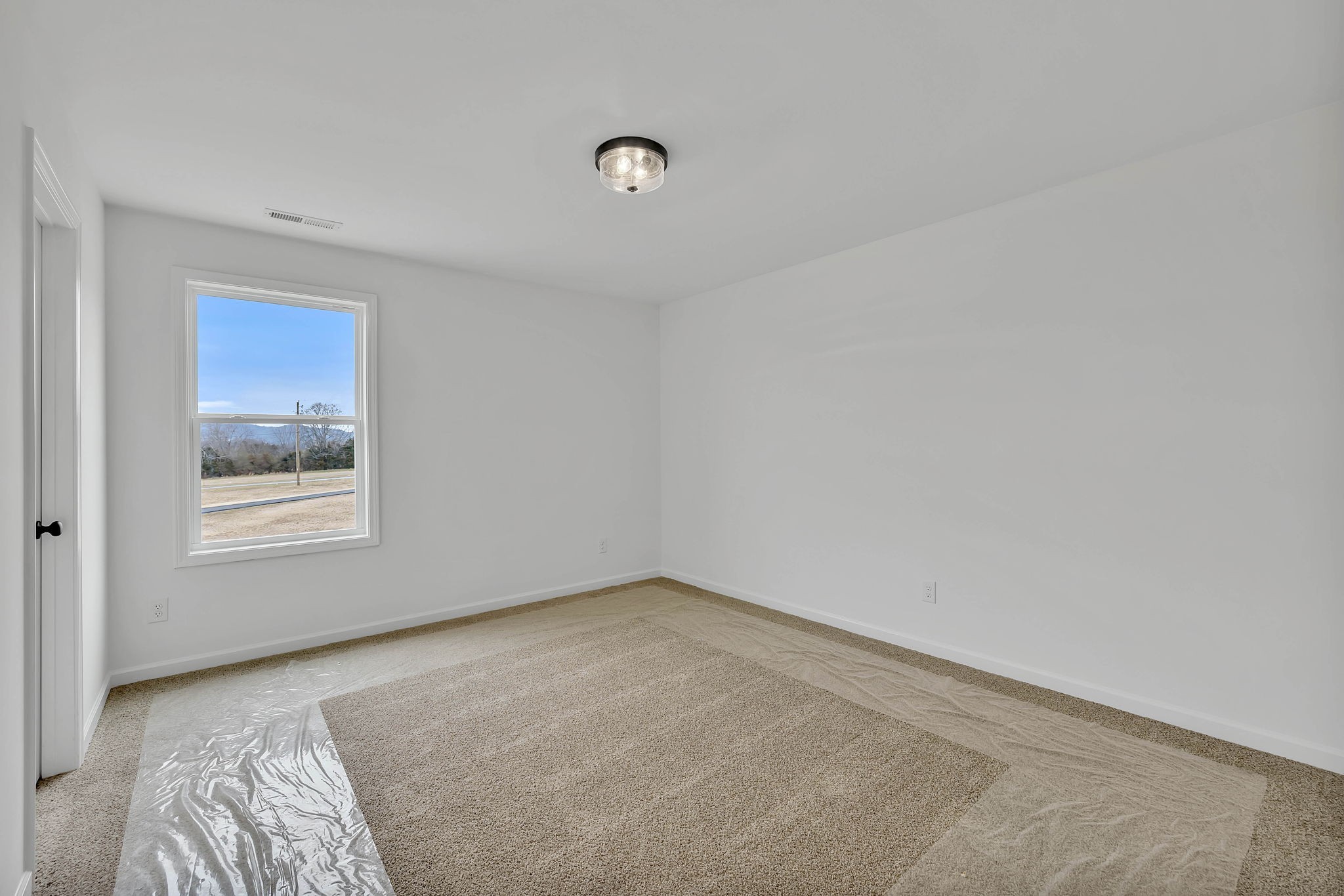 7341 North Milton Road Milton, TN 37118 - Photo 32 of 36 a view of a bedroom with a window