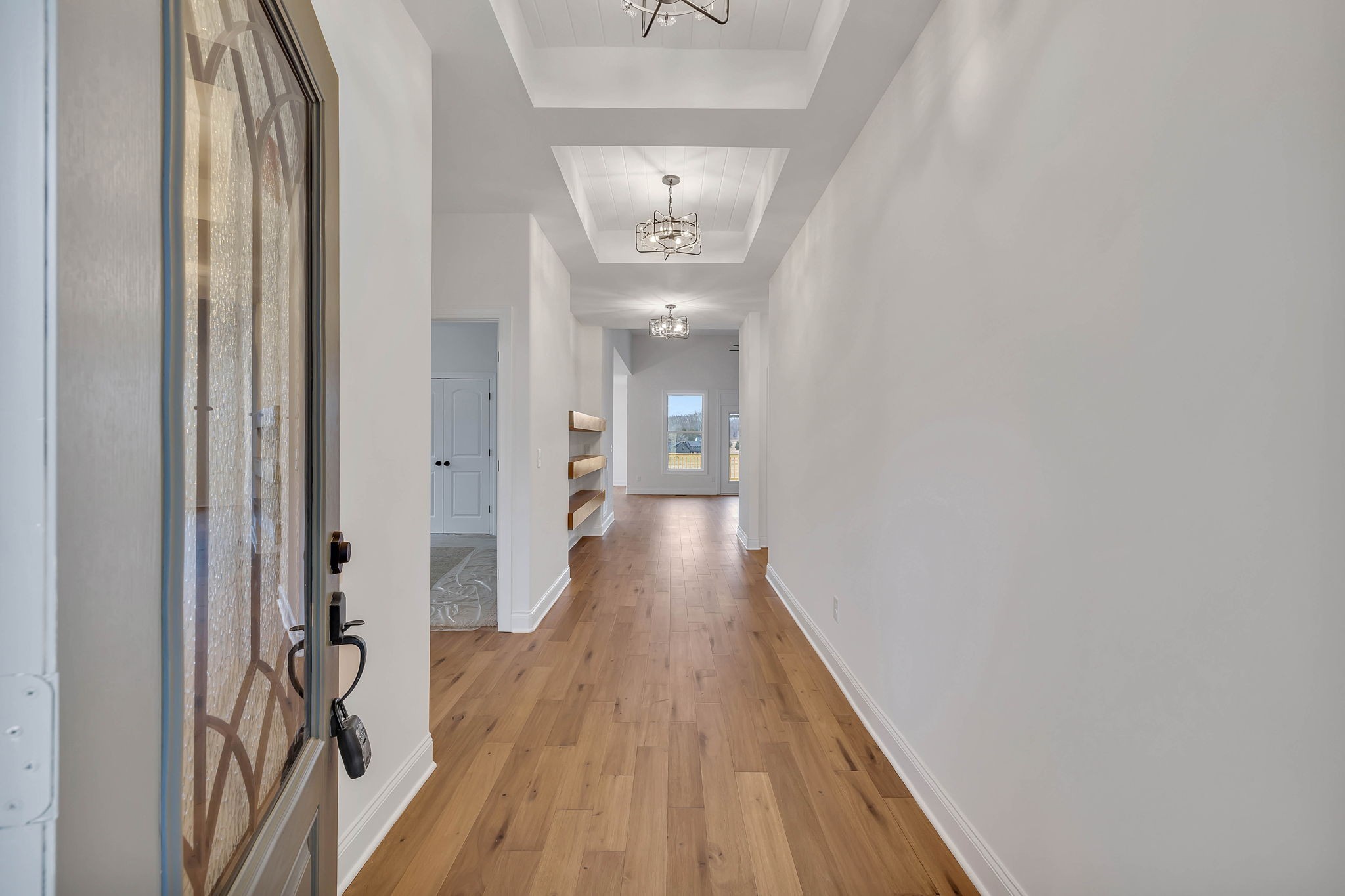 7341 North Milton Road Milton, TN 37118 - Photo 4 of 36 a view of a hallway with wooden floor