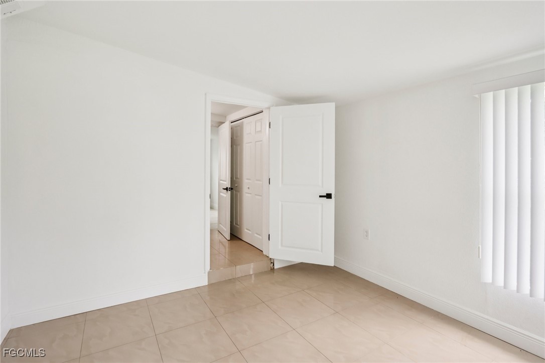 89 Cabana Avenue North Fort Myers, FL 33903 - Photo 15 of 29 an empty room with window