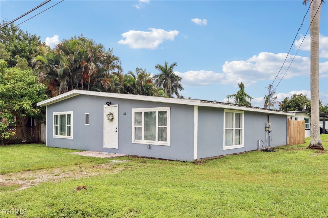 89 Cabana Avenue North Fort Myers, FL 33903 - Photo 25 of 29 a view of a house with a backyard