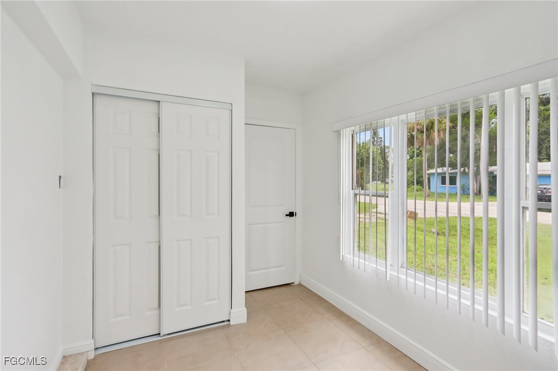 89 Cabana Avenue North Fort Myers, FL 33903 - Photo 7 of 29 a view of an empty room with glass door