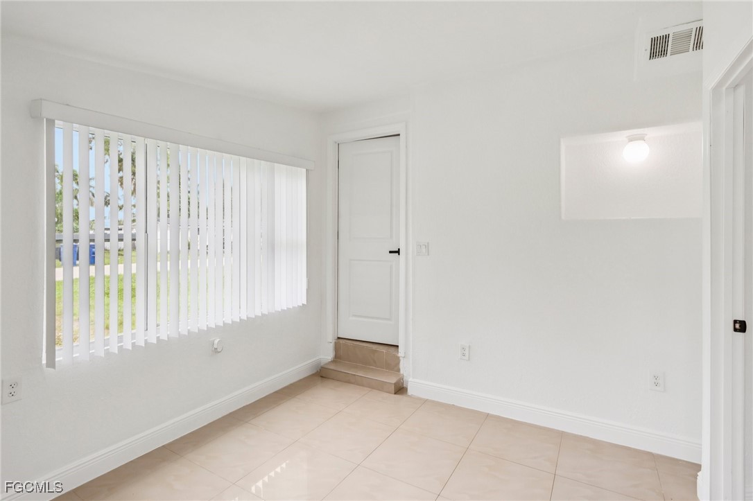 89 Cabana Avenue North Fort Myers, FL 33903 - Photo 8 of 29 a view of an empty room with a window