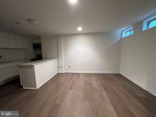 908 Chatsworth Drive Accokeek, MD 20607 - Photo 24 of 24 a view of a kitchen with wooden floor and electronic appliances