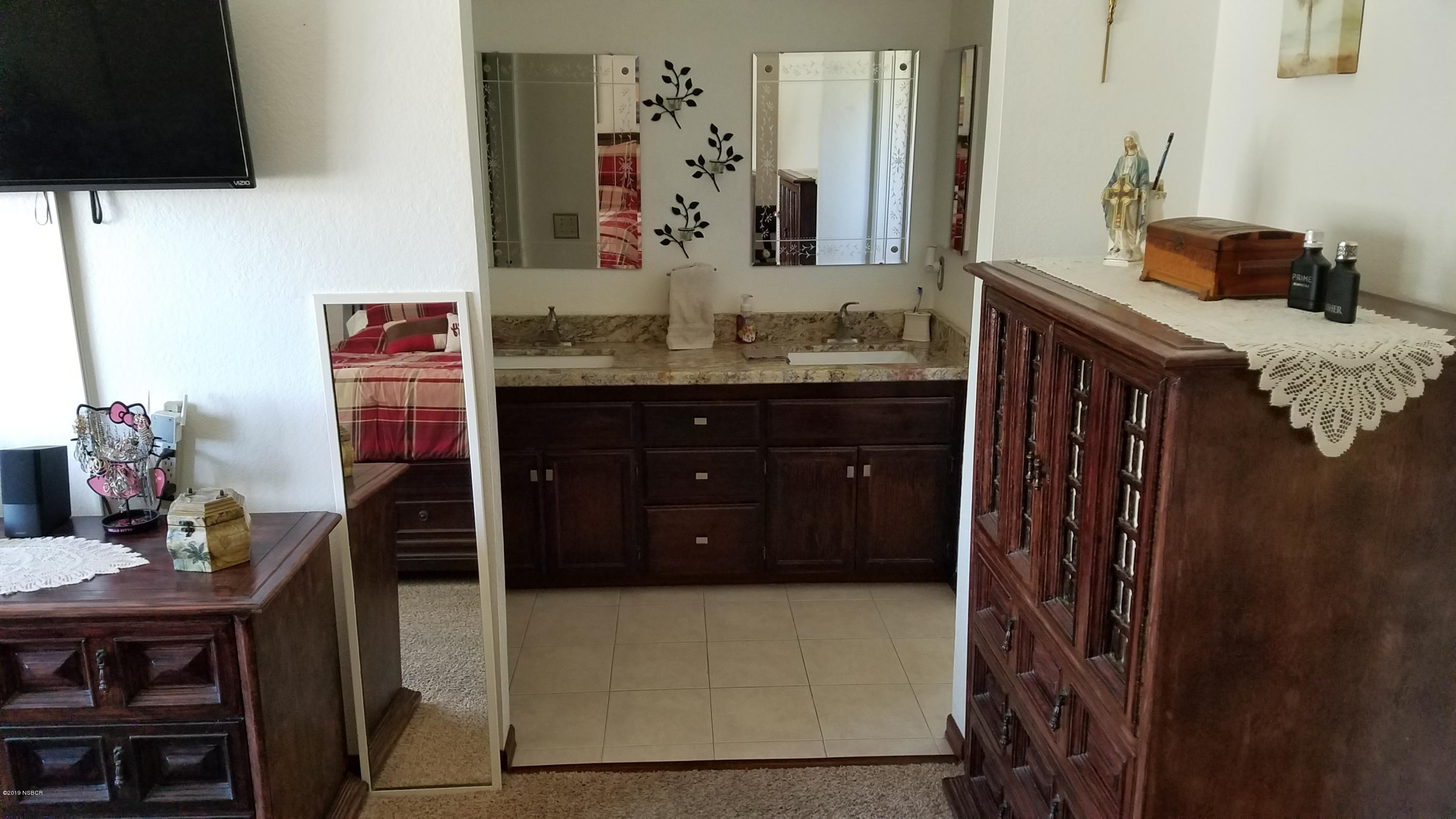 1302 Woodmere Road Santa Maria, CA 93455 - Photo 18 of 32 master Bed to Master Bathroom